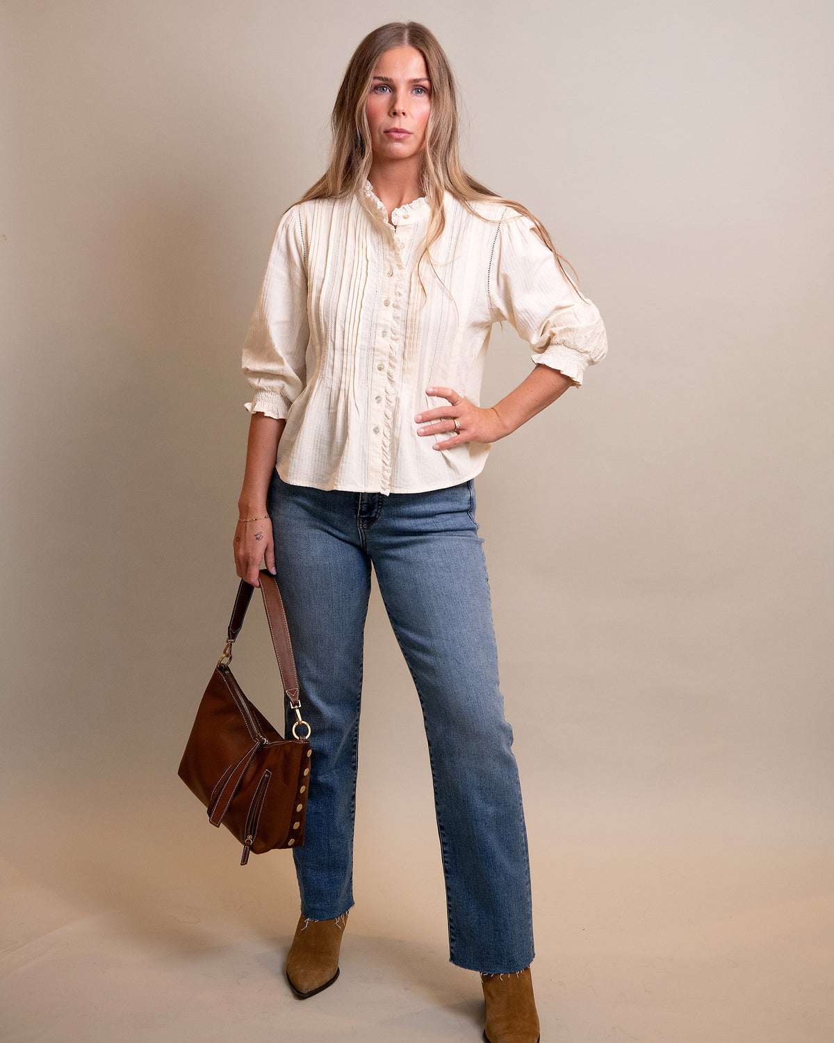 Ivory Veda blouse styled with blue denim.